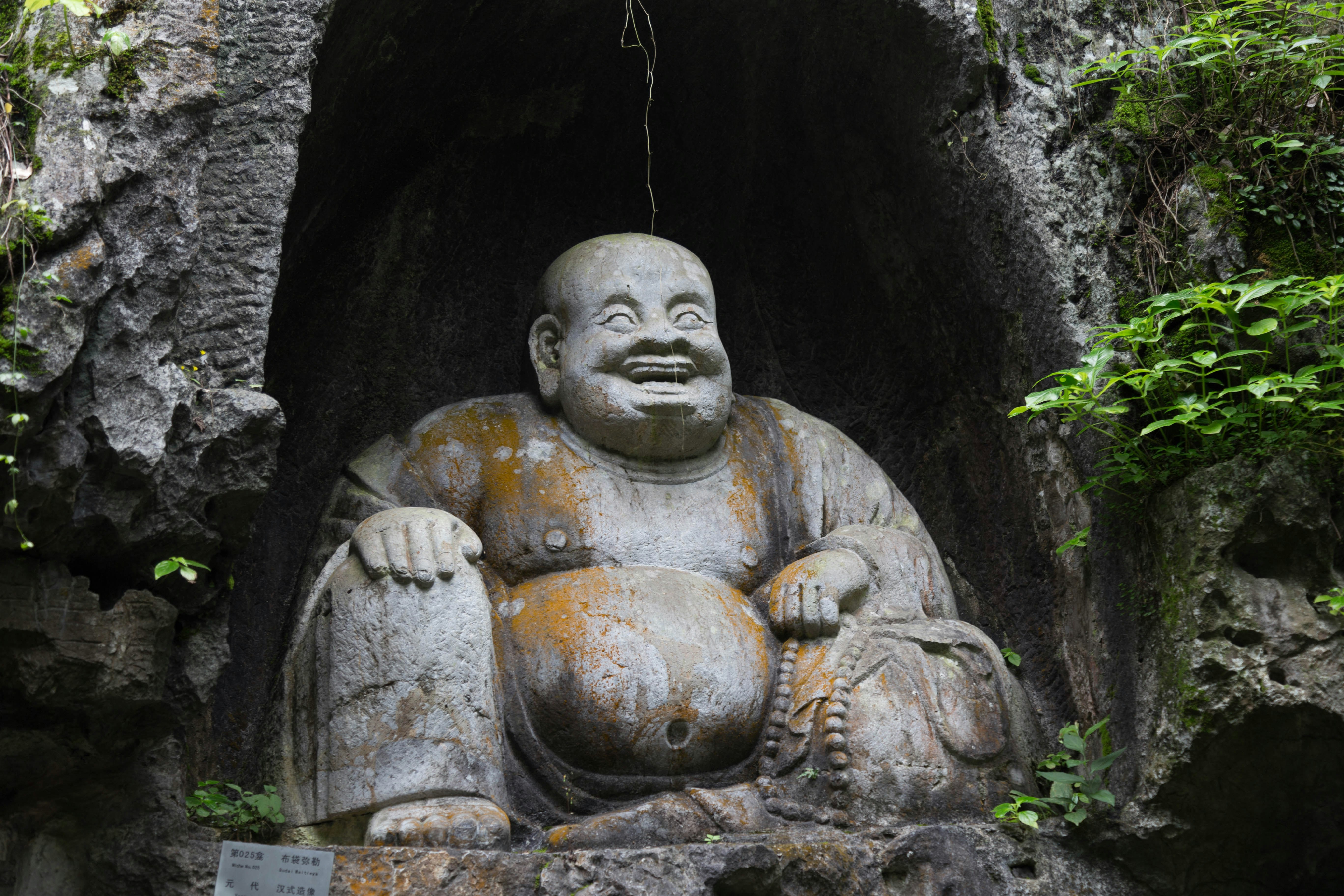 gray concrete buddha statue during daytime
